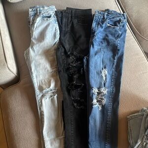 3 pairs of American Eagle next level stretch jeans